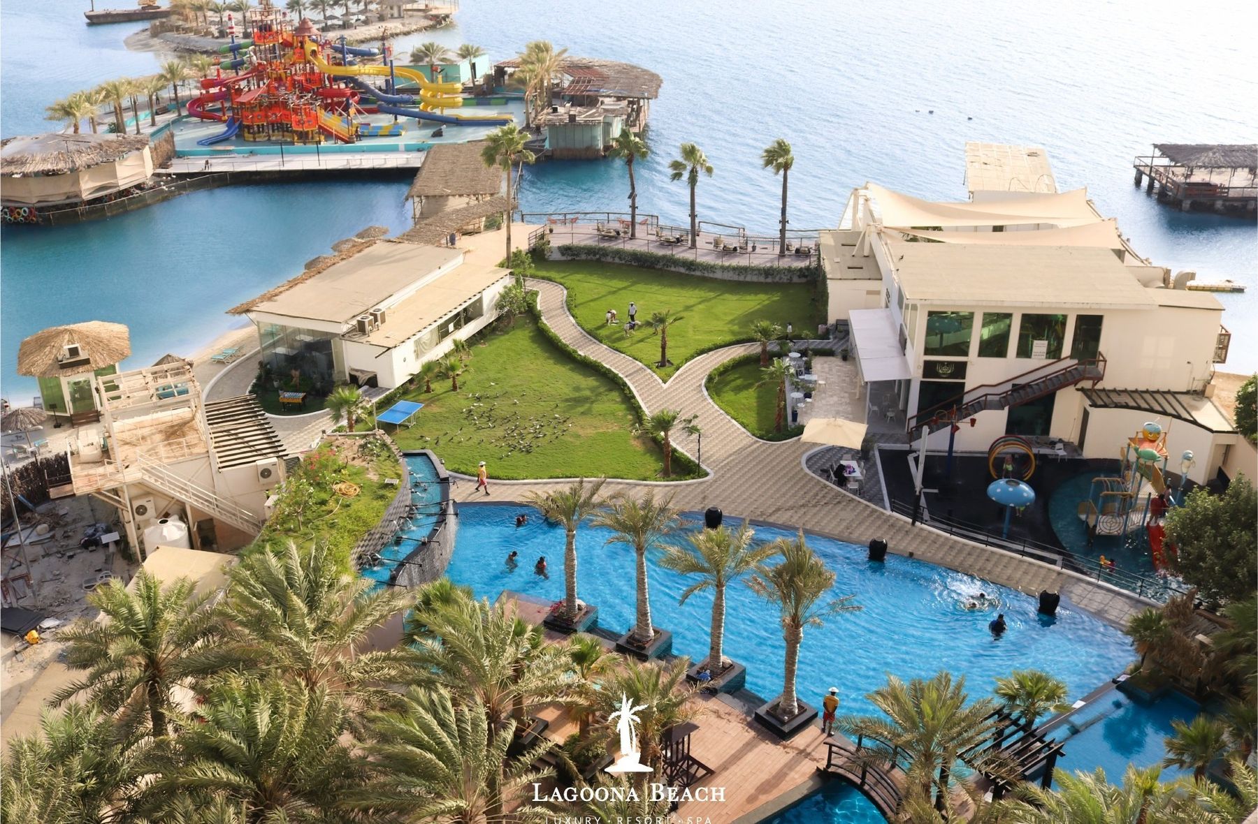 Aerial view of the resort's lagoon, pools and water park.